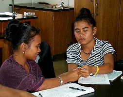 Students working in a physical
science laboratory