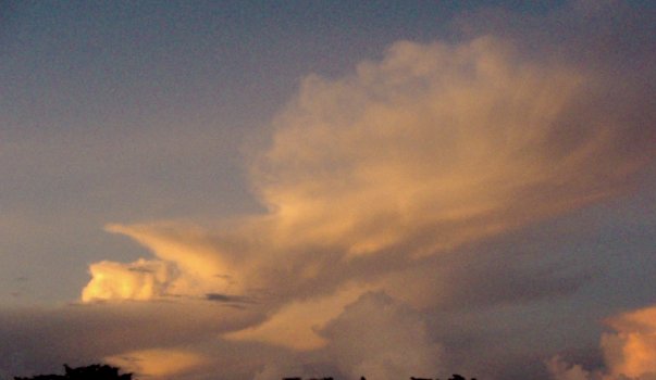 Cumulonimbus at sunset Cumulonimbus at sunset can display a spectacular array of colors ranging from reds to oranges and yellows.